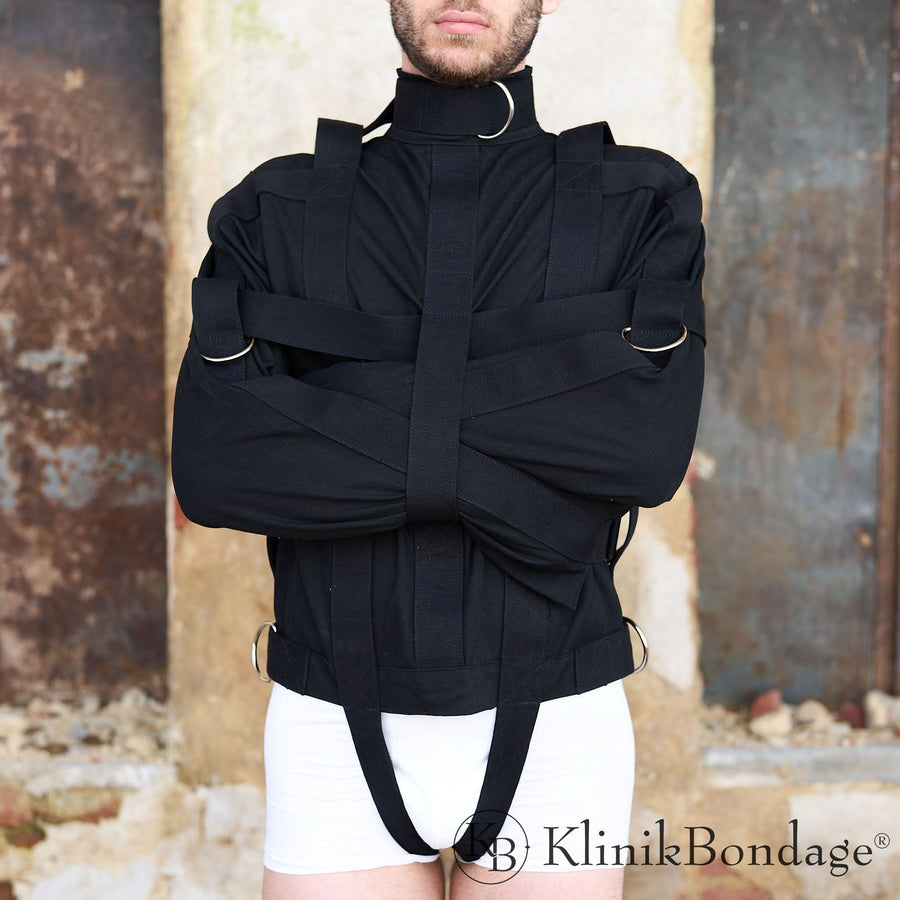 Schwarze Zwangsjacke aus hochwertigem Material mit stabilen Riemen und extra Fixiergurt für sichere Bondage-Fixierung und anspruchsvolles Suspension Play.