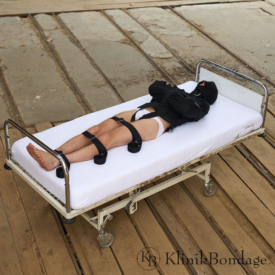 Zwangsjacke Bondage Set in Schwarz mit Masken und Fixiergurten für intensive BDSM-Sessions und maximale Bewegungseinschränkung.