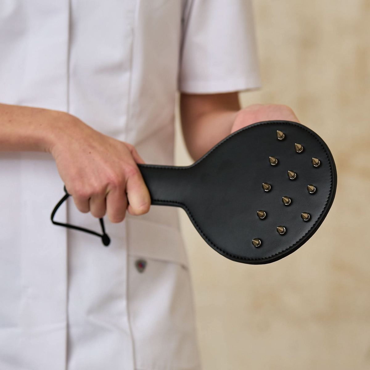 Spanking paddle with rivets - hard, precise & stylish